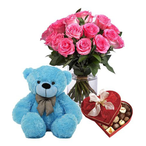 teddy bear with chocolate and roses