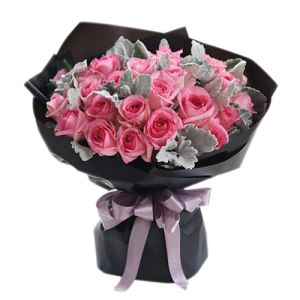 two dozen pink roses in a beautiful bouquet