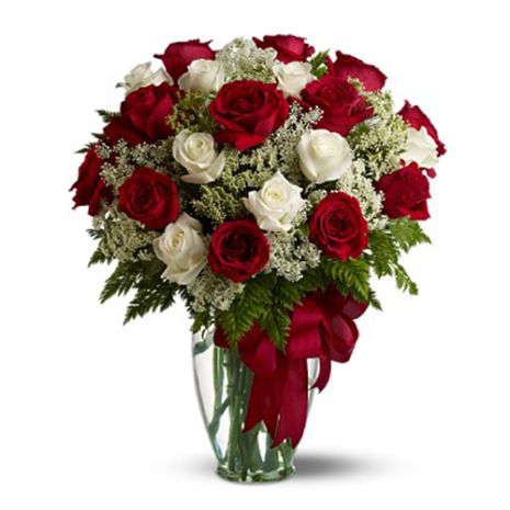red and white roses in glass vase to vietnam